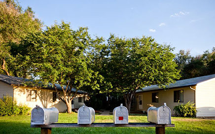 Two units of the Villages on Cherry with mailboxes in the foreground.