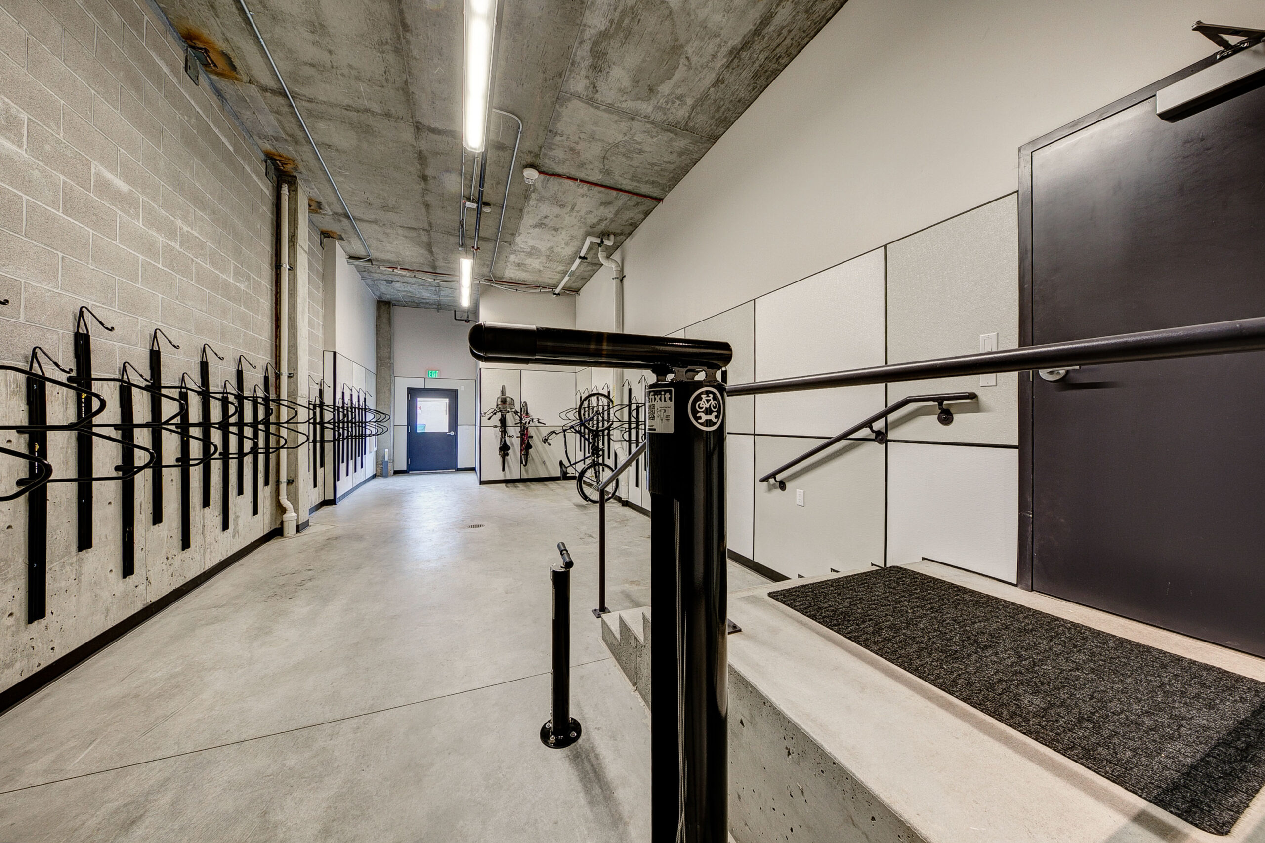 Large room with alley access and steel bike racks
