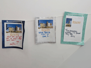 banner made from quotes from residents at Redtail Ponds anniversary celebration