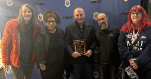 photo of dallas receiving his award